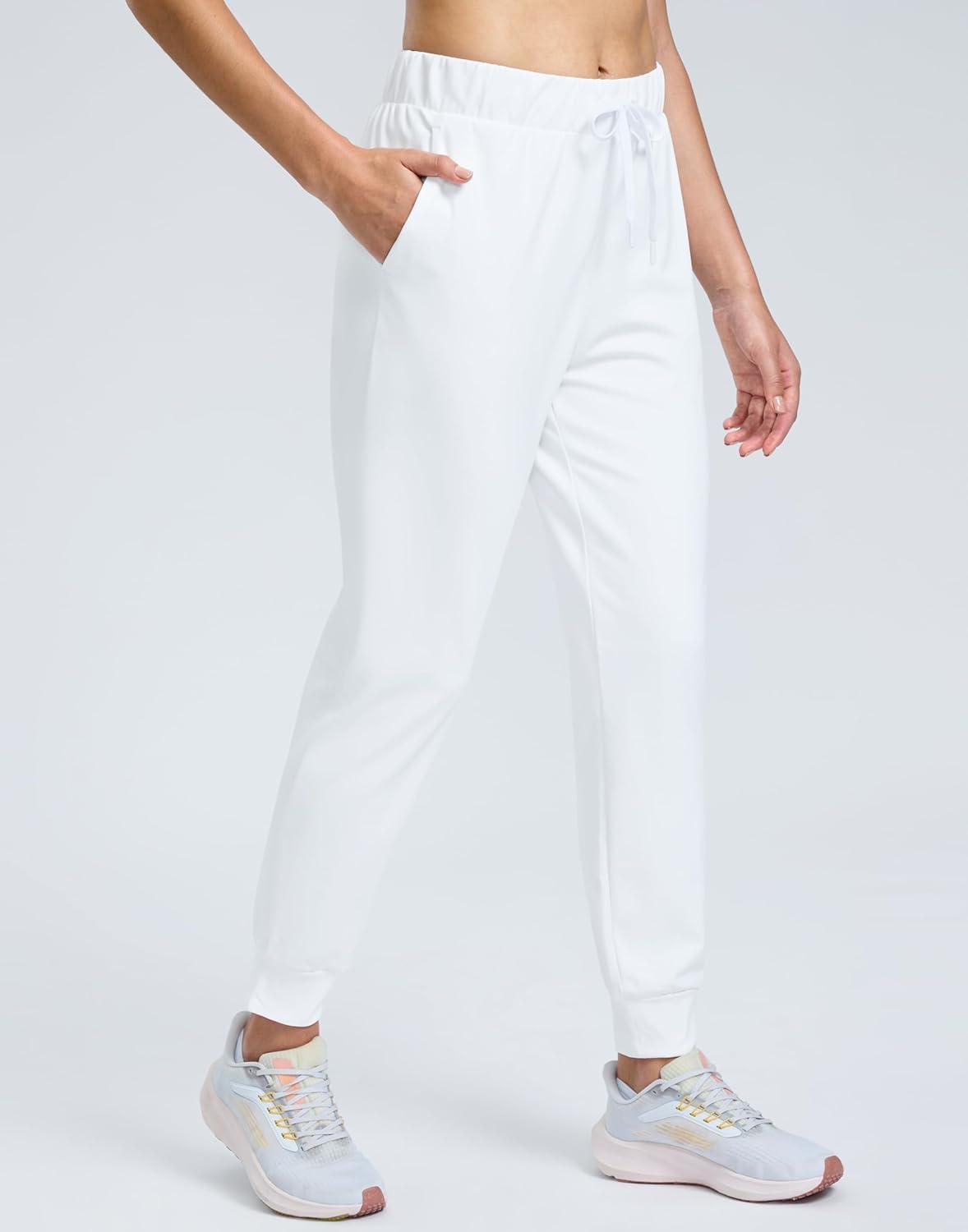 imageSANTINY Womens Fleece Lined Joggers Pockets Drawstring Waterproof Sweatpants Thermal Ski Running Winter Hiking Pants WomenWhite