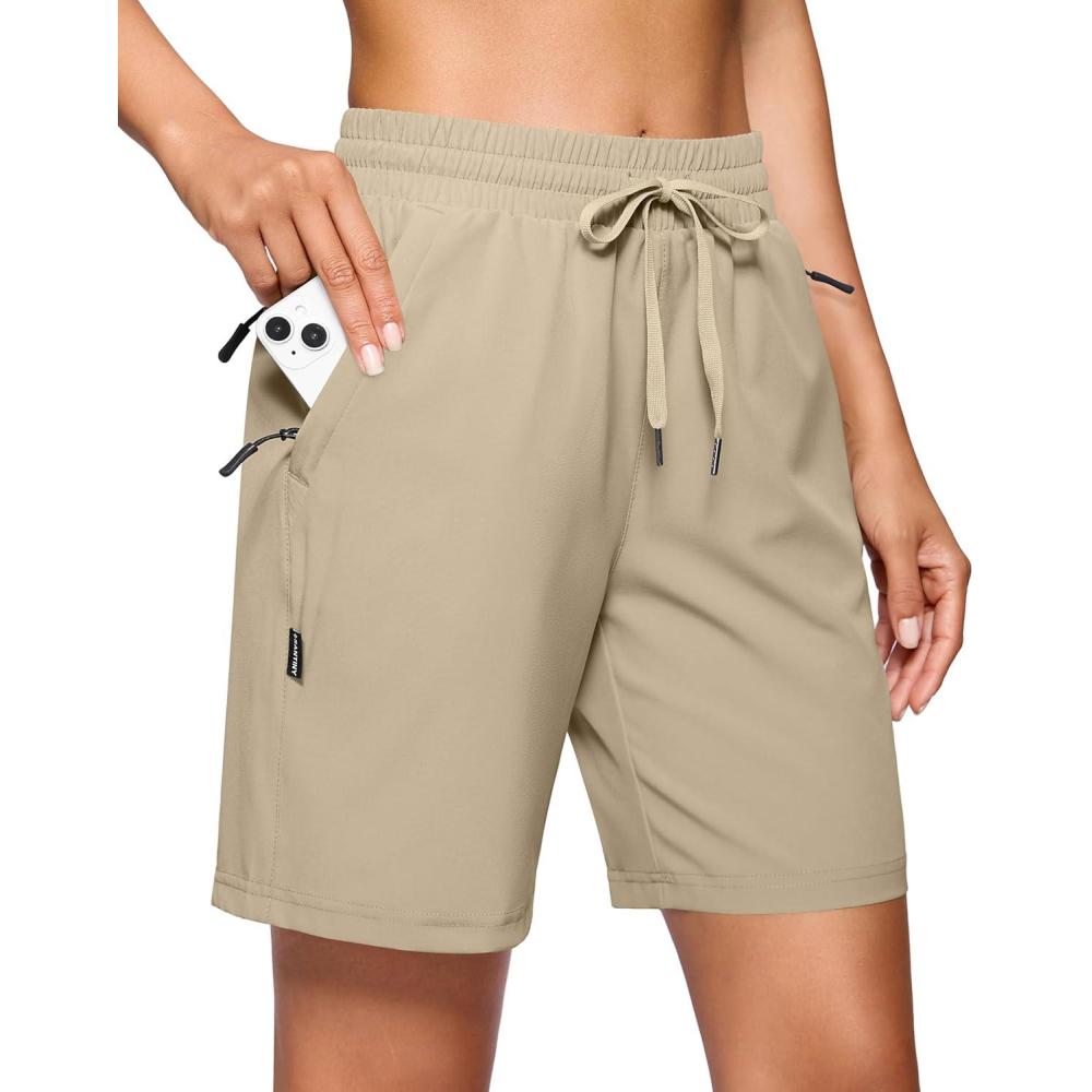 imageSANTINY Womens 7 9 Hiking Shorts with 3 Zipper Pockets Lightweight Quick Dry Long Athletic Golf Shorts for Women CasualKhaki