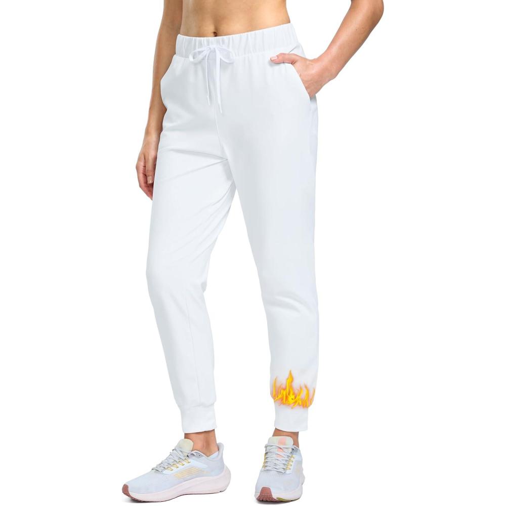 imageSANTINY Womens Fleece Lined Joggers Pockets Drawstring Waterproof Sweatpants Thermal Ski Running Winter Hiking Pants WomenWhite