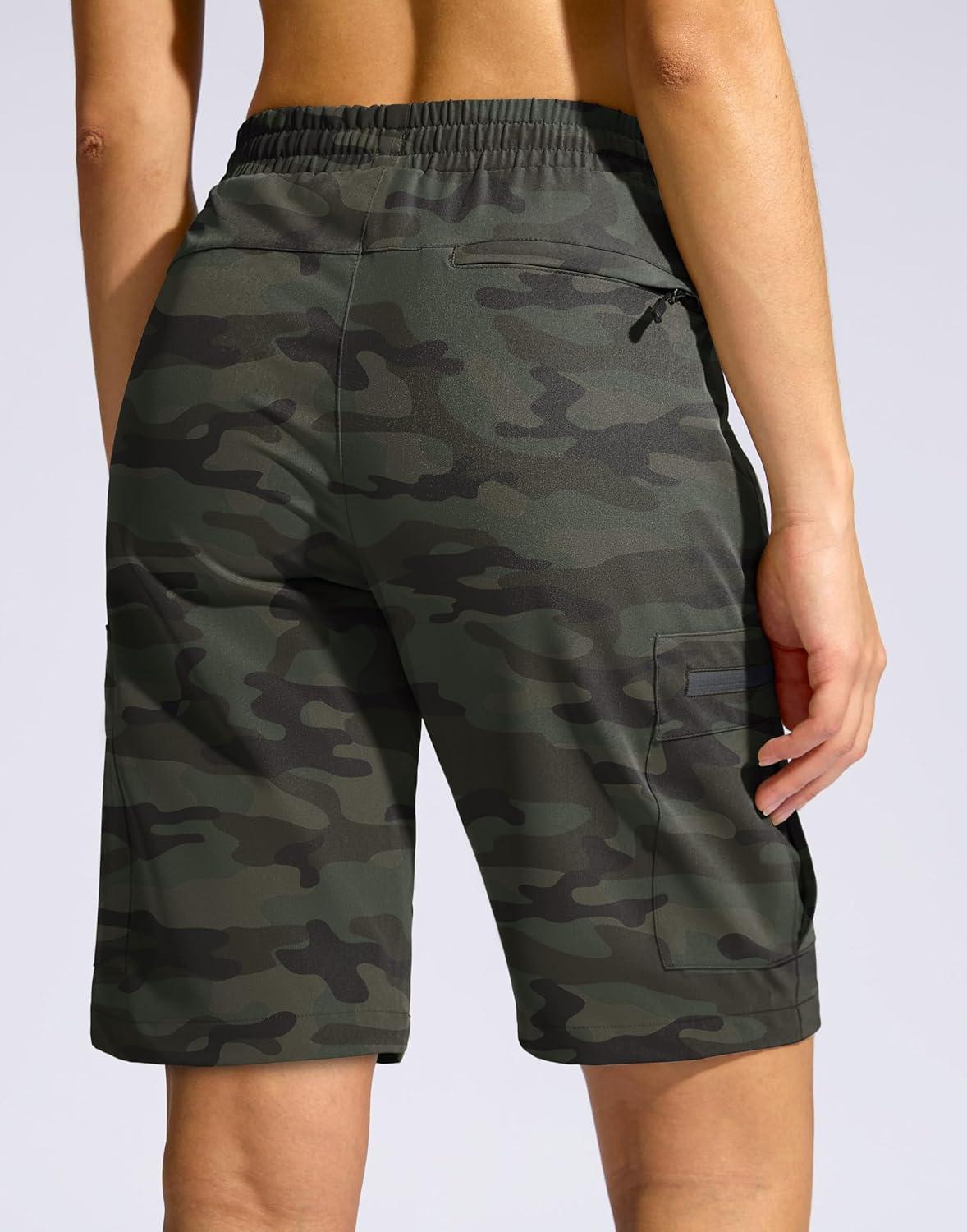 imageSANTINY Womens 10 Lightweight Hiking Cargo Shorts with 5 Zipper Pockets Quick Dry Summer Long Travel Golf Shorts for WomenGreen Camo