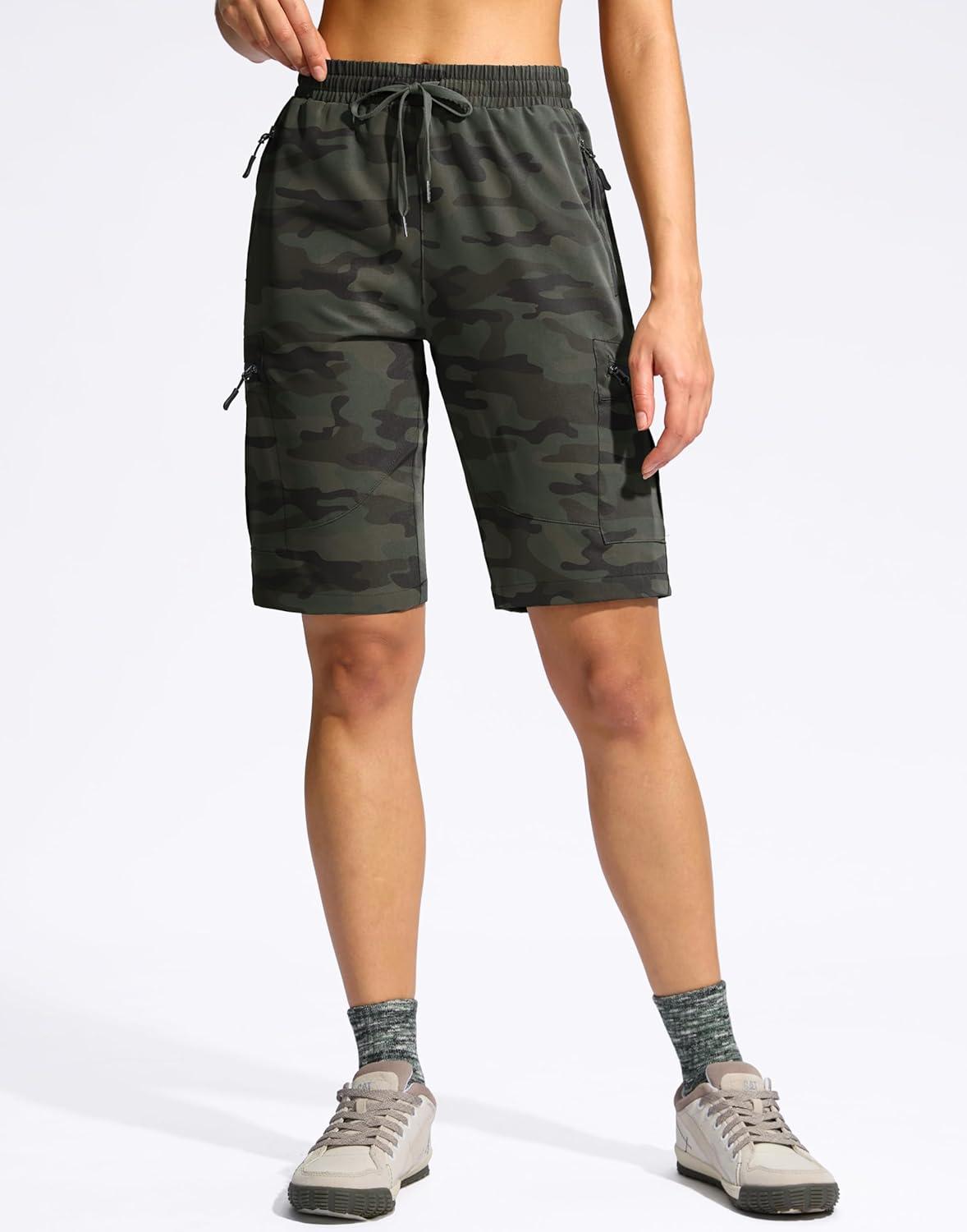 imageSANTINY Womens 10 Lightweight Hiking Cargo Shorts with 5 Zipper Pockets Quick Dry Summer Long Travel Golf Shorts for WomenGreen Camo