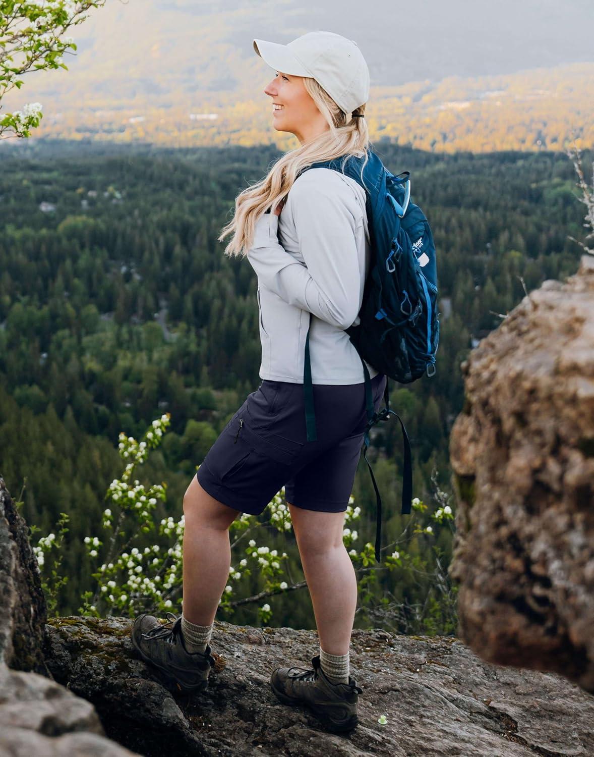 imageSANTINY Womens 10 Lightweight Hiking Cargo Shorts with 5 Zipper Pockets Quick Dry Summer Long Travel Golf Shorts for WomenNavy