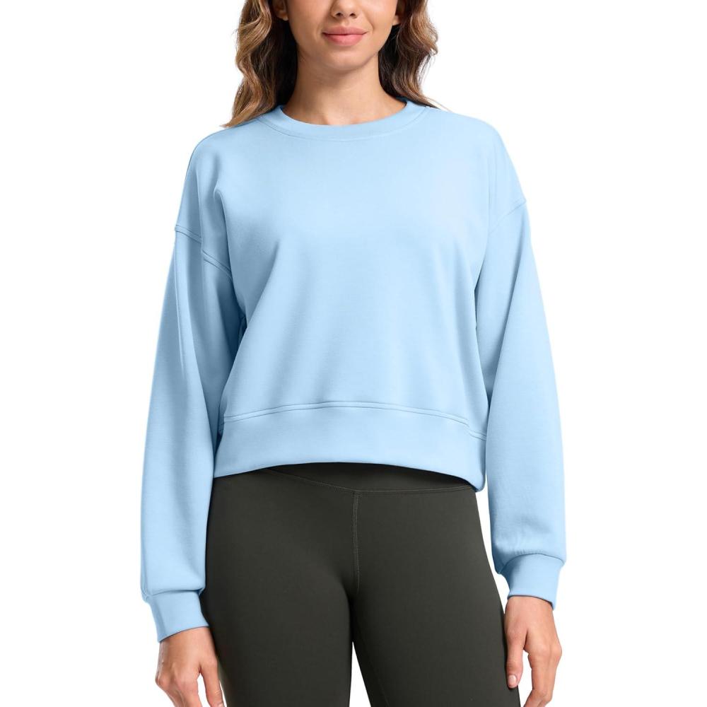 imageSANTINY Fleece Cropped Sweatshirts for Women Soft Crewneck Sweatshirt Pullover Long Sleeve Workout Crop TopsLight Blue