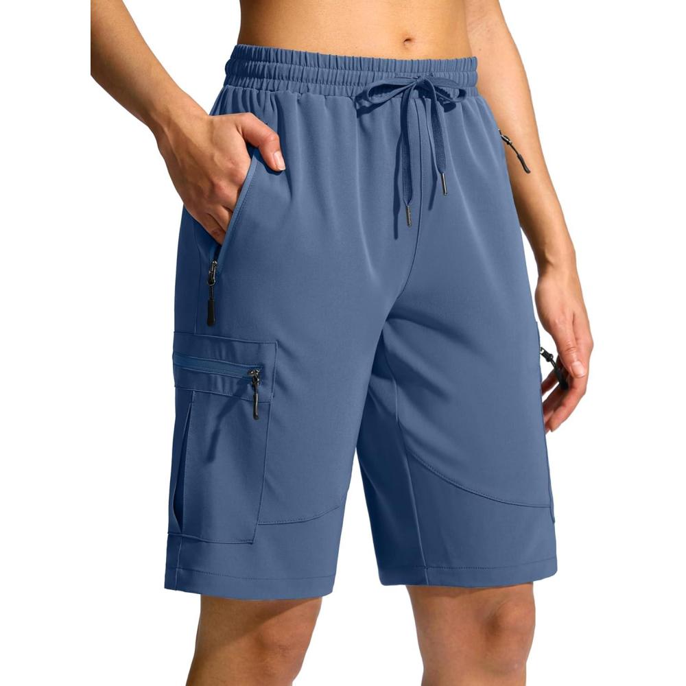 imageSANTINY Womens 10 Lightweight Hiking Cargo Shorts with 5 Zipper Pockets Quick Dry Summer Long Travel Golf Shorts for WomenBlue