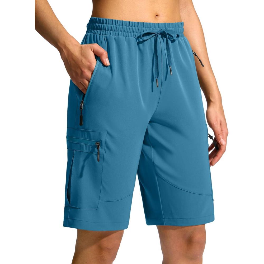 imageSANTINY Womens 10 Lightweight Hiking Cargo Shorts with 5 Zipper Pockets Quick Dry Summer Long Travel Golf Shorts for WomenBlue Green