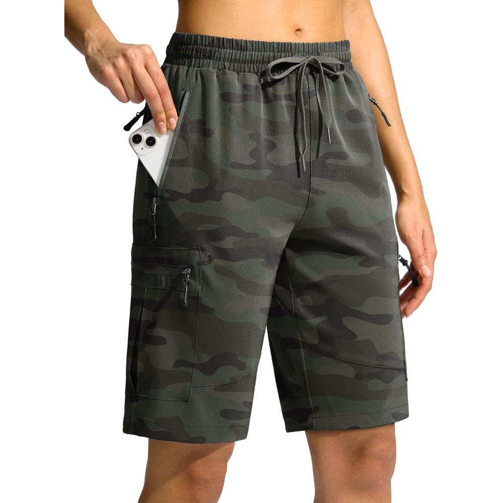 imageSANTINY Womens 10 Lightweight Hiking Cargo Shorts with 5 Zipper Pockets Quick Dry Summer Long Travel Golf Shorts for WomenGreen Camo
