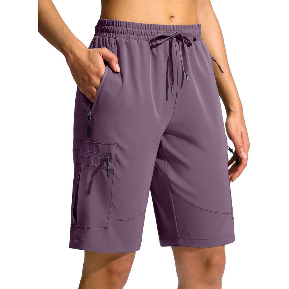 imageSANTINY Womens 10 Lightweight Hiking Cargo Shorts with 5 Zipper Pockets Quick Dry Summer Long Travel Golf Shorts for WomenPurple
