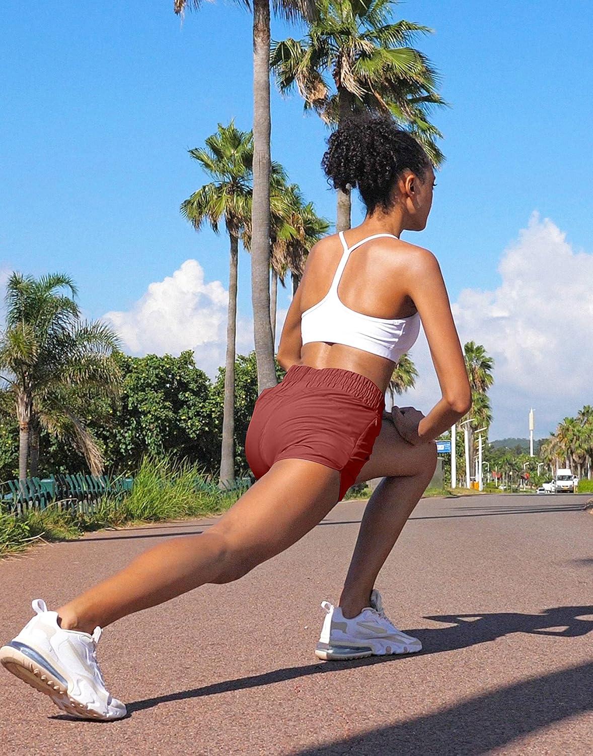 imageSANTINY Womens Running Shorts with Zip Pockets High Waisted Athletic Workout Gym Shorts for Women with LinerSavannah