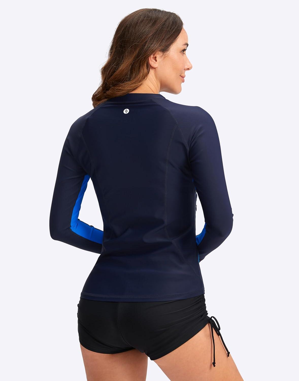 imageSANTINY Womens Rash Guard Zipper Pockets UPF50 Sun Protection Long Sleeve Swimsuit Top Zip Front Swim Shirt for WomenNavy Vivid Blue
