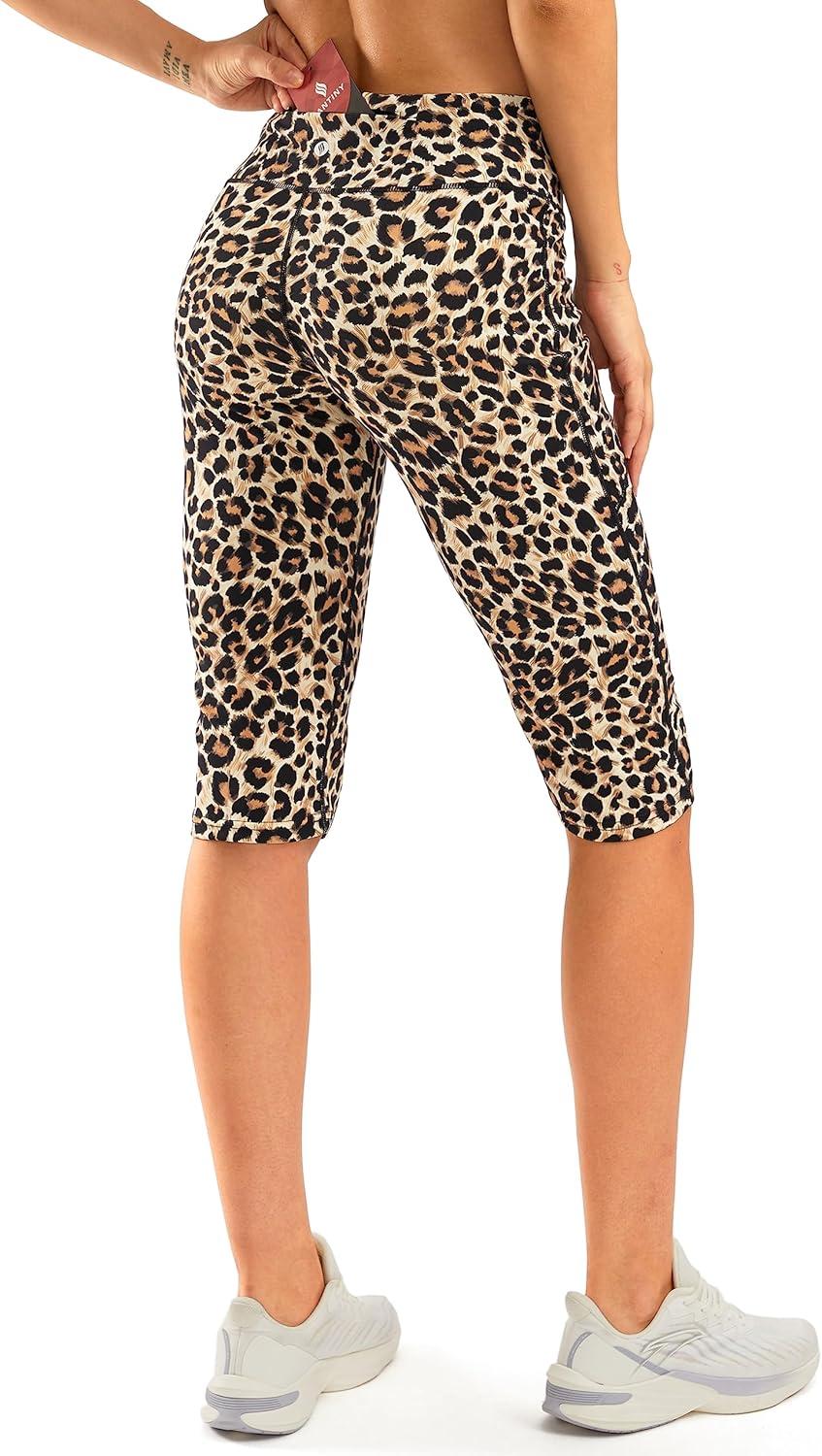 imageSANTINY Womens Knee Length Capri Leggings with Pockets High Waisted Workout Exercise Yoga Capris Pants for WomenLeopard