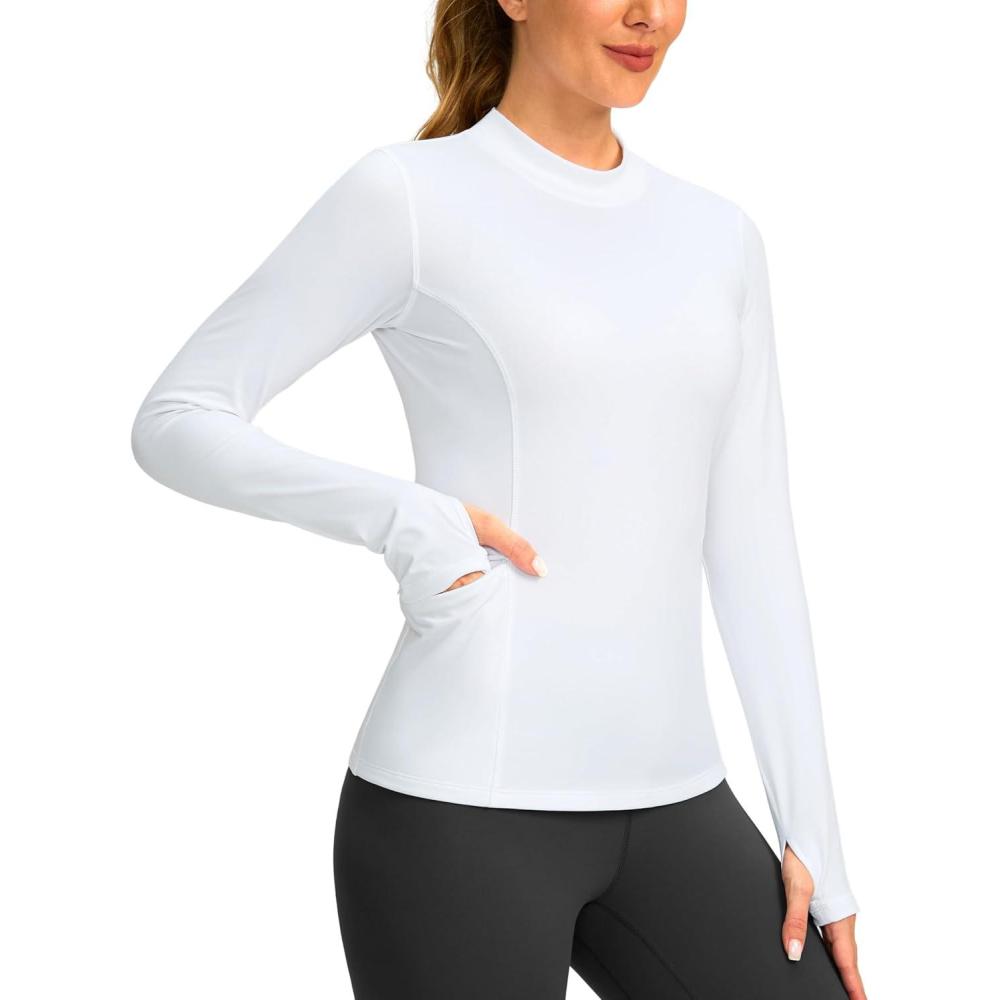 imageSANTINY Long Sleeve Thermal Shirts for Women Fleece Mock Neck Tops Winter Workout Running Gear with Zipper PocketsWhite