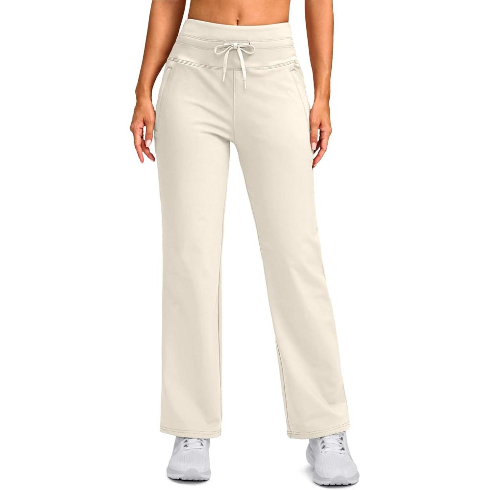 imageSANTINY Womens Fleece Lined Pants 29quot Winter Warm Sweatpants Water Resistant Snow Ski Hiking Pants with Zipper PocketsBeige