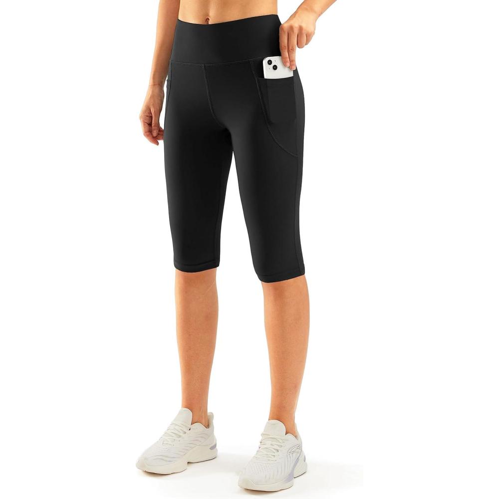 imageSANTINY Womens Knee Length Capri Leggings with Pockets High Waisted Workout Exercise Yoga Capris Pants for WomenBlack