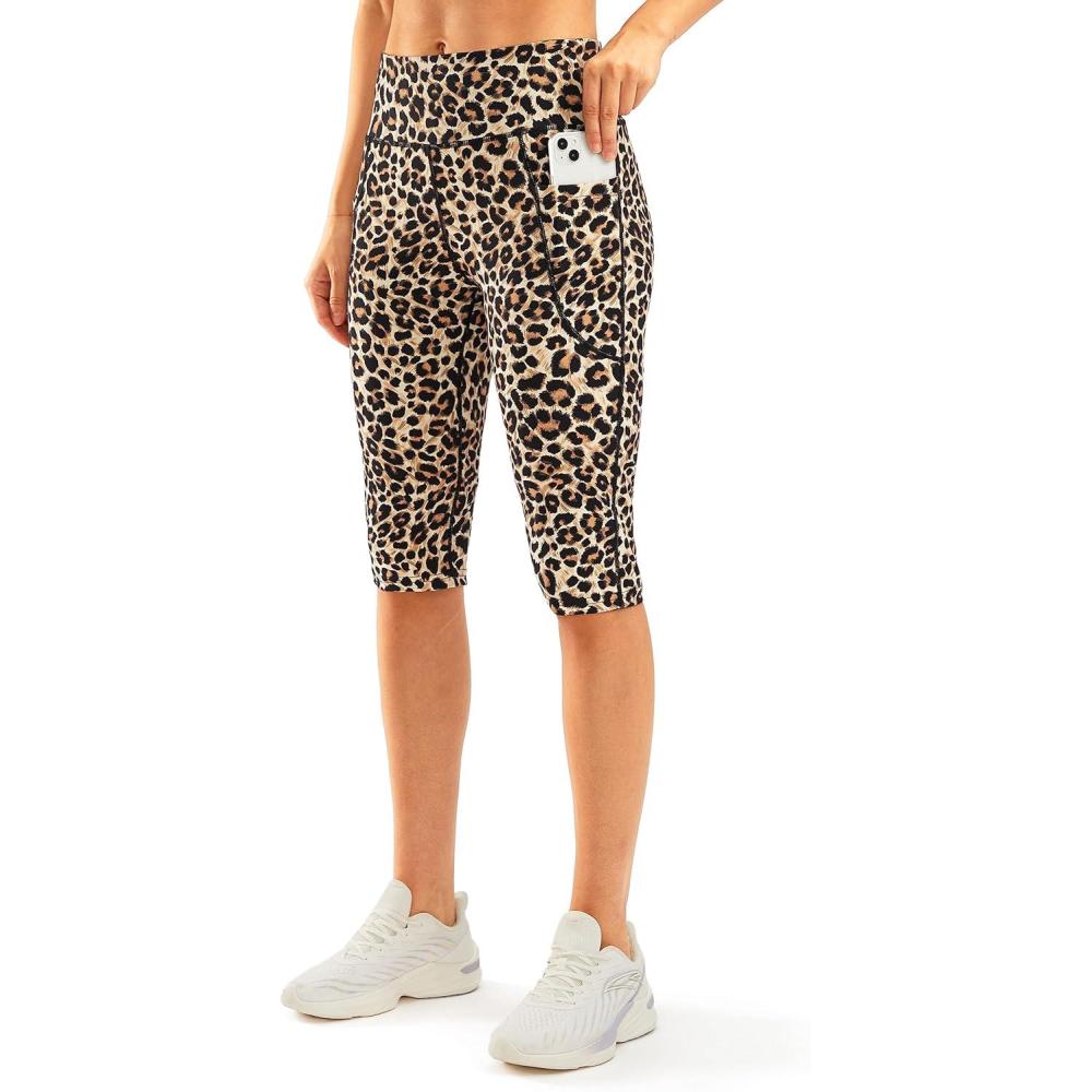 imageSANTINY Womens Knee Length Capri Leggings with Pockets High Waisted Workout Exercise Yoga Capris Pants for WomenLeopard