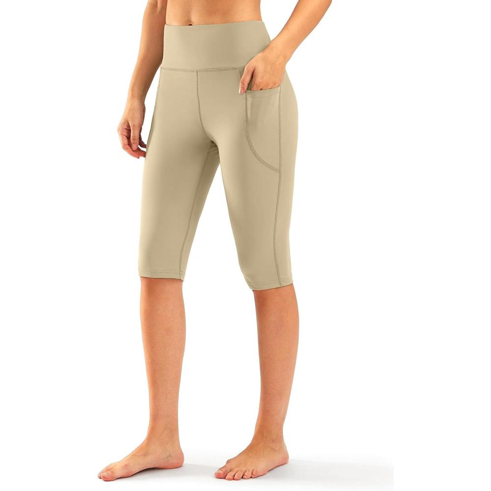imageSANTINY Womens Knee Length Capri Leggings with Pockets High Waisted Workout Exercise Yoga Capris Pants for WomenStone