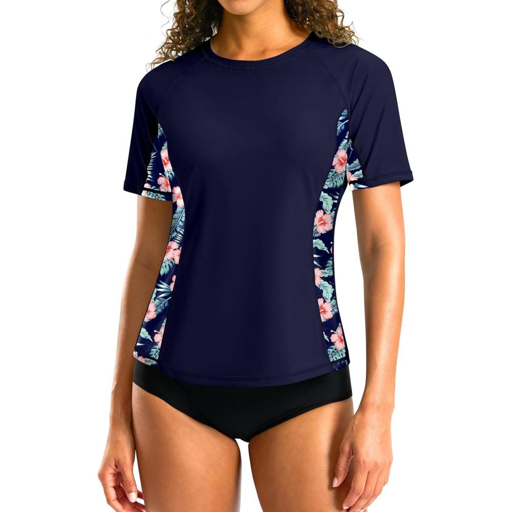 imageSANTINY Rash Guard for Women UPF 50 Bathing Suit Sun Protection Short Sleeve Swimsuit Top Quick Dry Swim Shirts for WomenNavy Floral