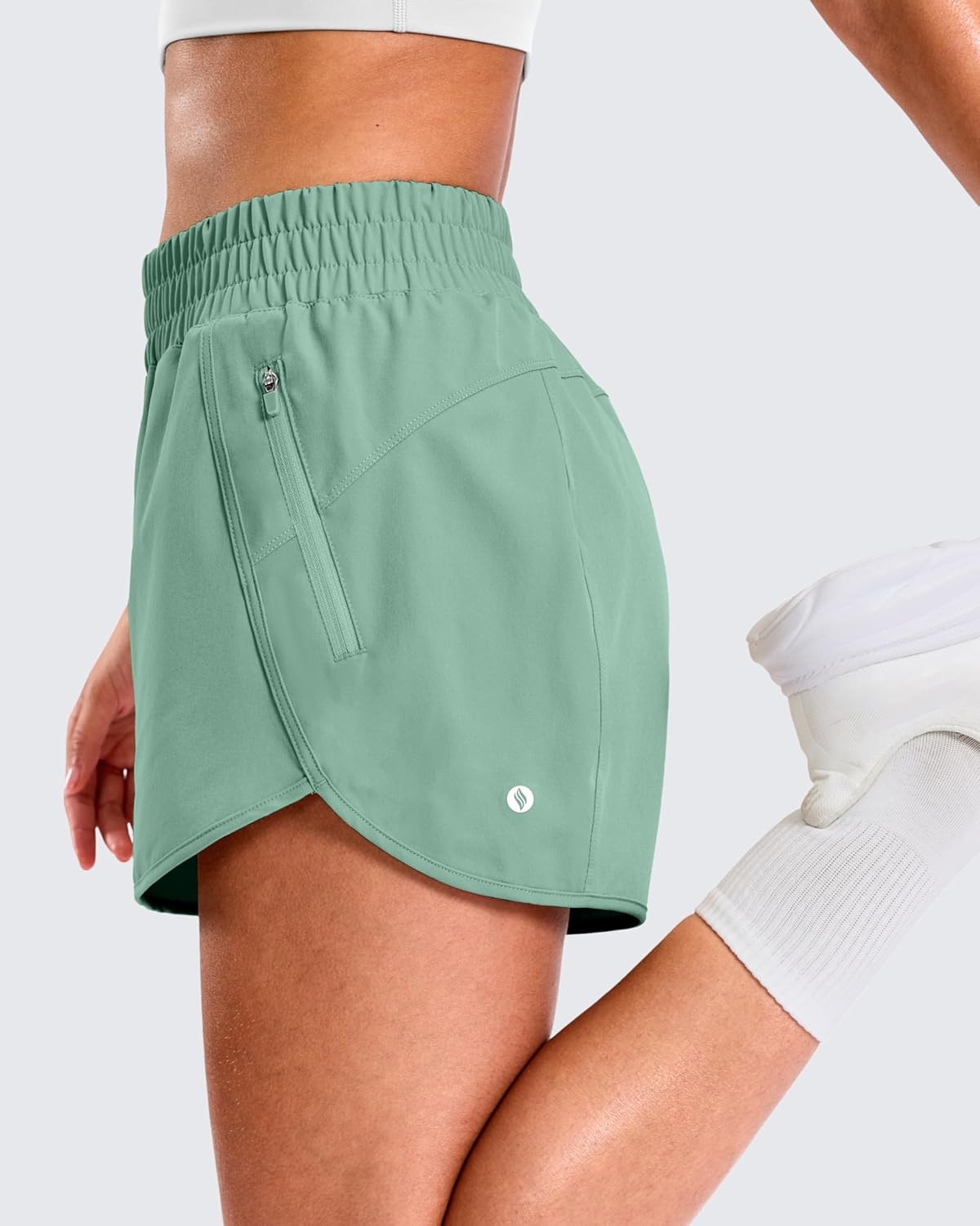 image:imageSANTINY 34 Athletic Running Shorts for Women Dolphin High Waisted Quick Dry Workout Gym Shorts with Zipper PocketLight Green