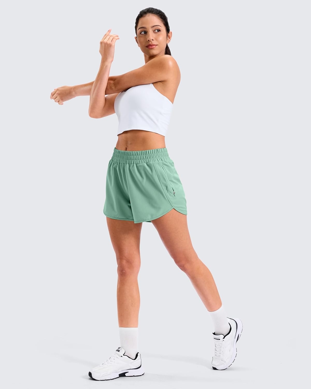 image:imageSANTINY 34 Athletic Running Shorts for Women Dolphin High Waisted Quick Dry Workout Gym Shorts with Zipper PocketLight Green