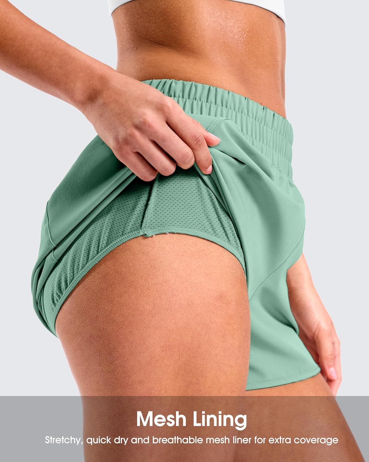 image:imageSANTINY 34 Athletic Running Shorts for Women Dolphin High Waisted Quick Dry Workout Gym Shorts with Zipper PocketLight Green