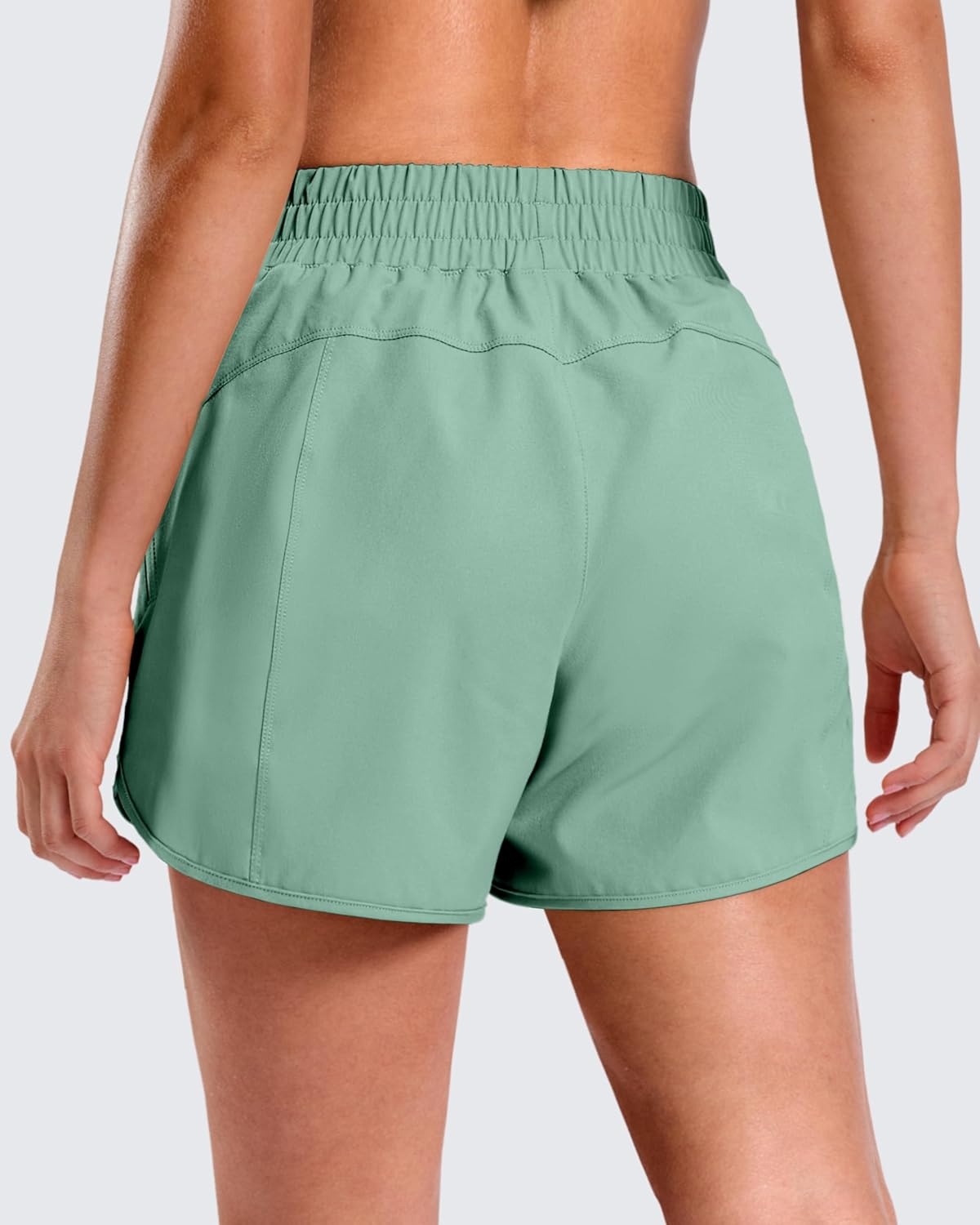 image:imageSANTINY 34 Athletic Running Shorts for Women Dolphin High Waisted Quick Dry Workout Gym Shorts with Zipper PocketLight Green