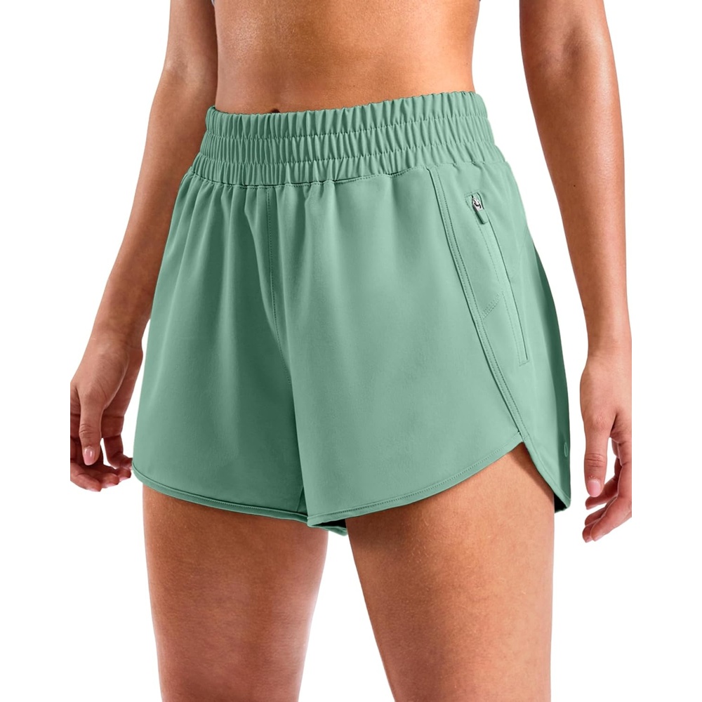 image:imageSANTINY 34 Athletic Running Shorts for Women Dolphin High Waisted Quick Dry Workout Gym Shorts with Zipper PocketLight Green